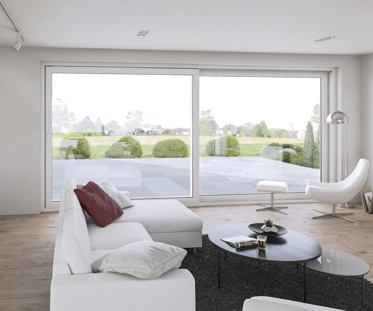 Große Fenster im Wohnzimmer: Ausstattung von SYSTEM MASSIVHAUS in Naumburg